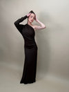 Model wearing the Selena Dress featuring a one-shoulder elegant evening silhouette