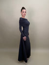 Side view of the Alina Dress highlighting its refined draped silhouette